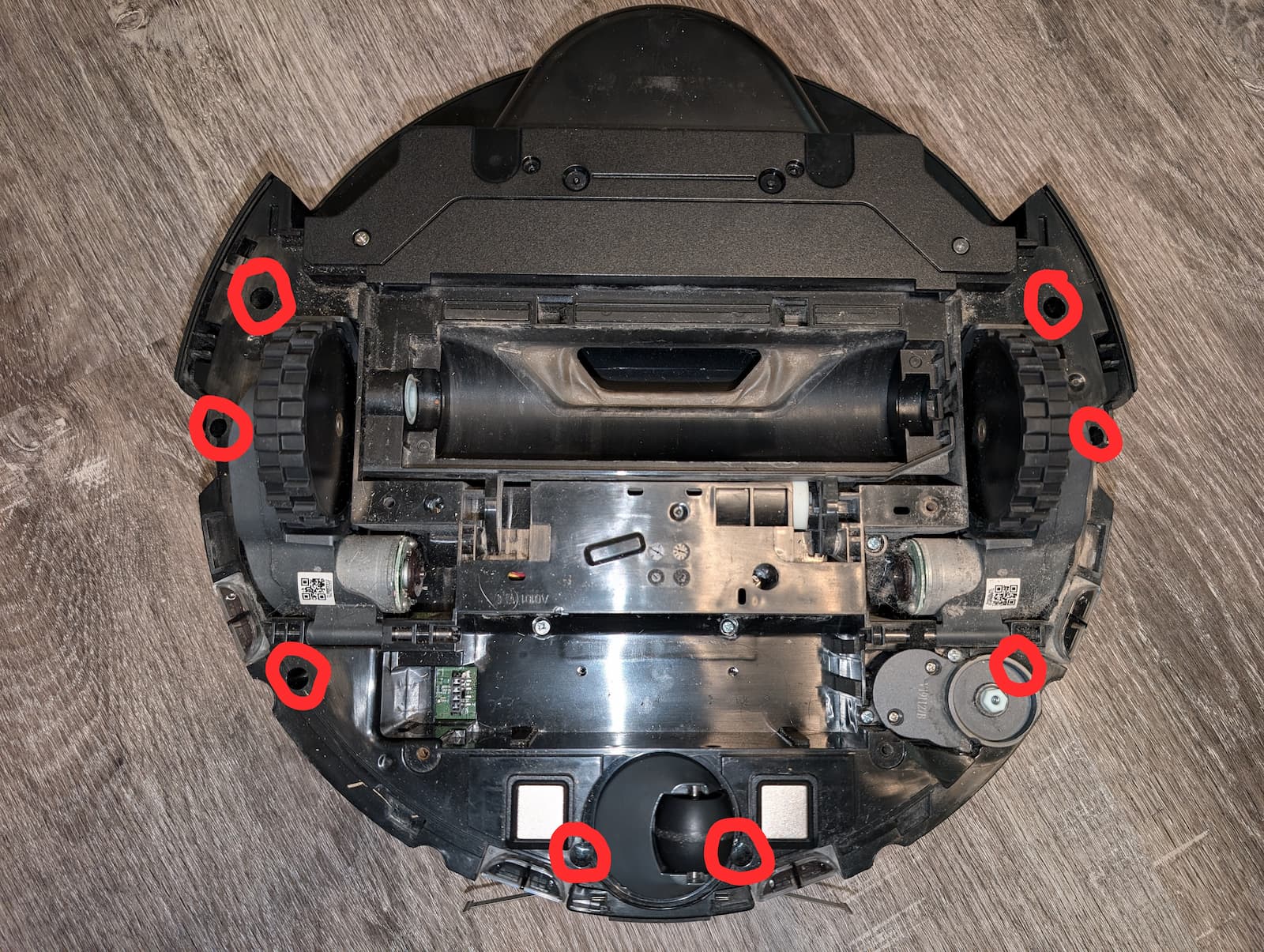 Eight recessed screws along the edges of the robot.