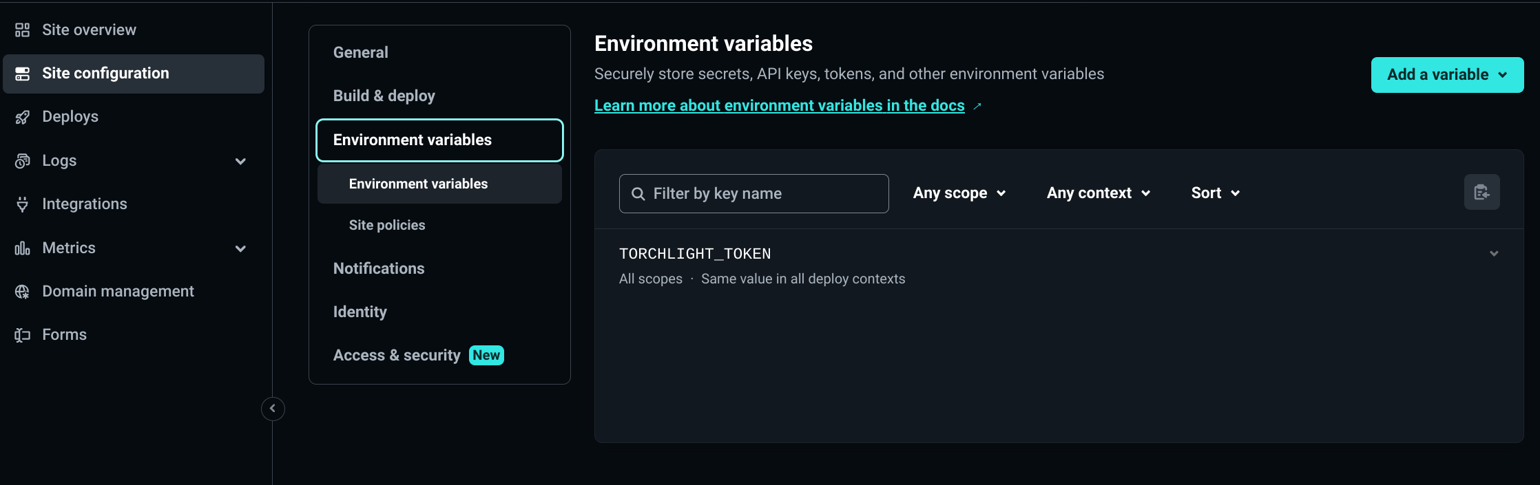 Screenshot showing the creation of the 'TORCHLIGHT_TOKEN' variable in Netlify