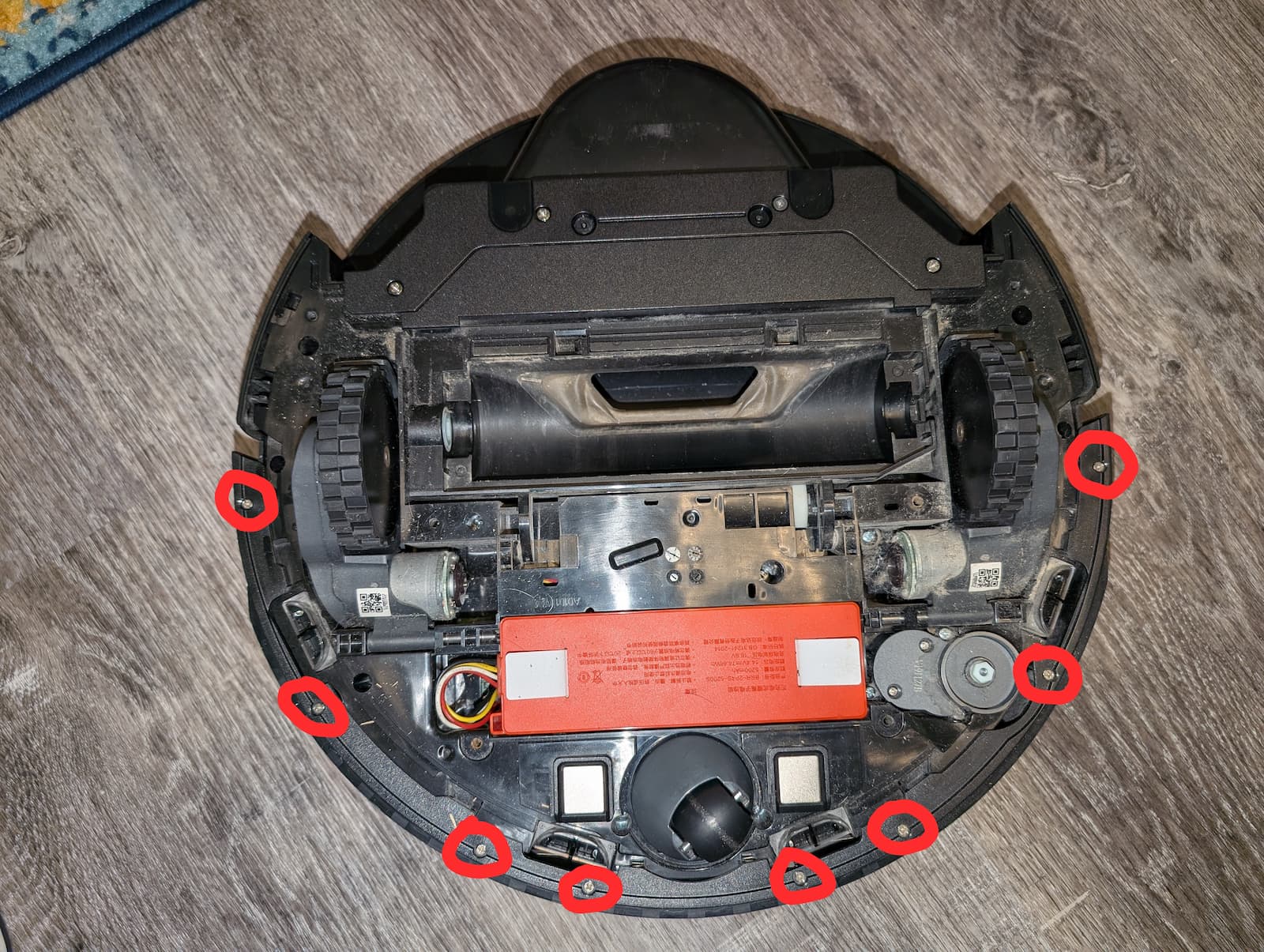 Eight small screws hold the bumper assembly.